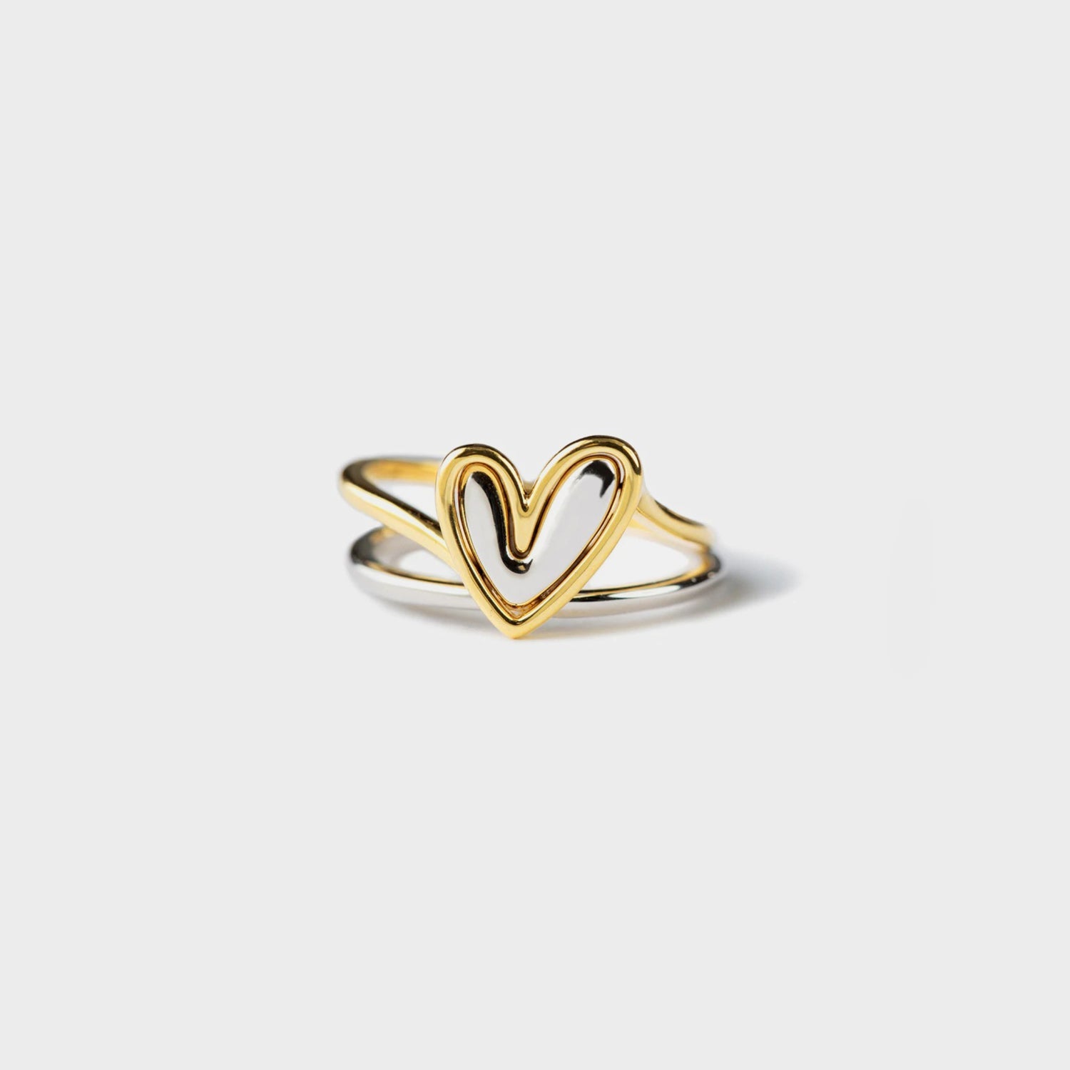 Beautiful heart-shaped puzzle ring made of sterling silver and plated in gold.