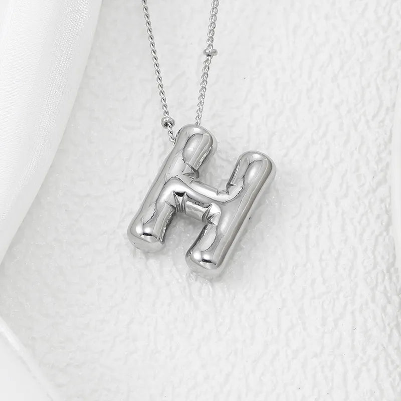 Copper Bubble Letter Pendant Necklace – Platinum-Plated Charm - consueloalondra