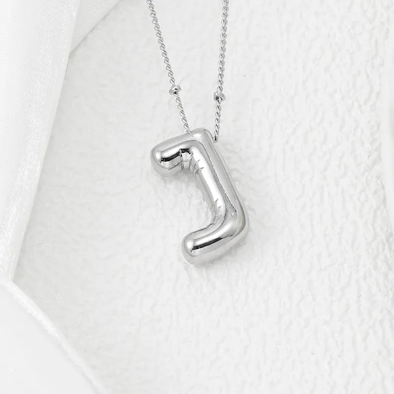 Copper Bubble Letter Pendant Necklace – Platinum-Plated Charm - consueloalondra