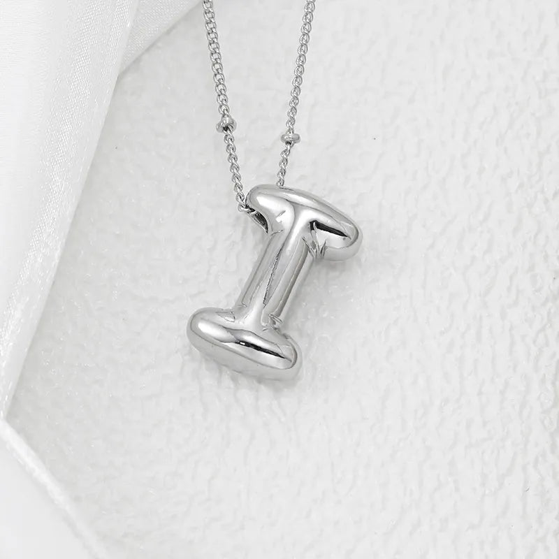 Copper Bubble Letter Pendant Necklace – Platinum-Plated Charm - consueloalondra