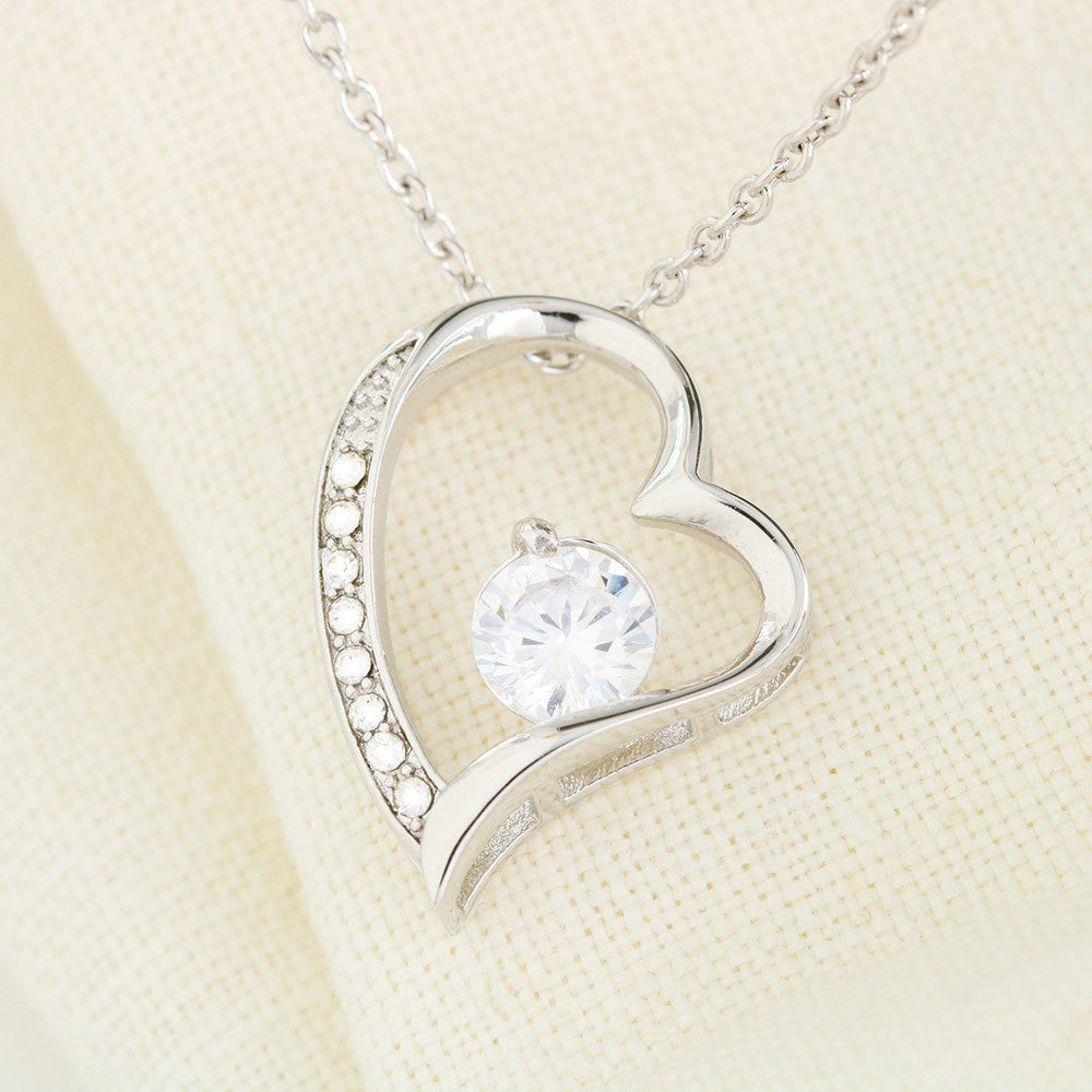 White Gold Heart Pendant with Crystals Decorated. 