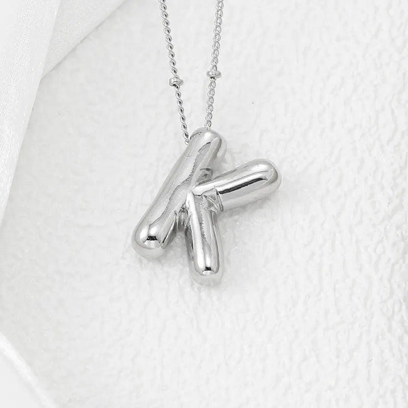 Copper Bubble Letter Pendant Necklace – Platinum-Plated Charm - consueloalondra