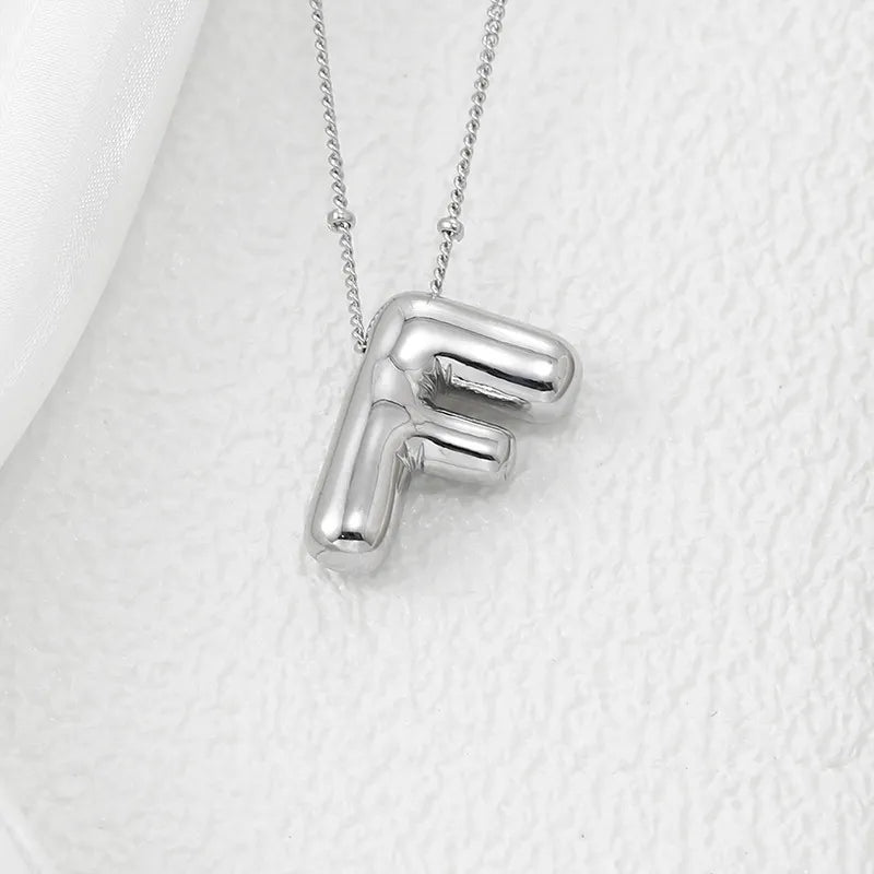 Copper Bubble Letter Pendant Necklace – Platinum-Plated Charm - consueloalondra