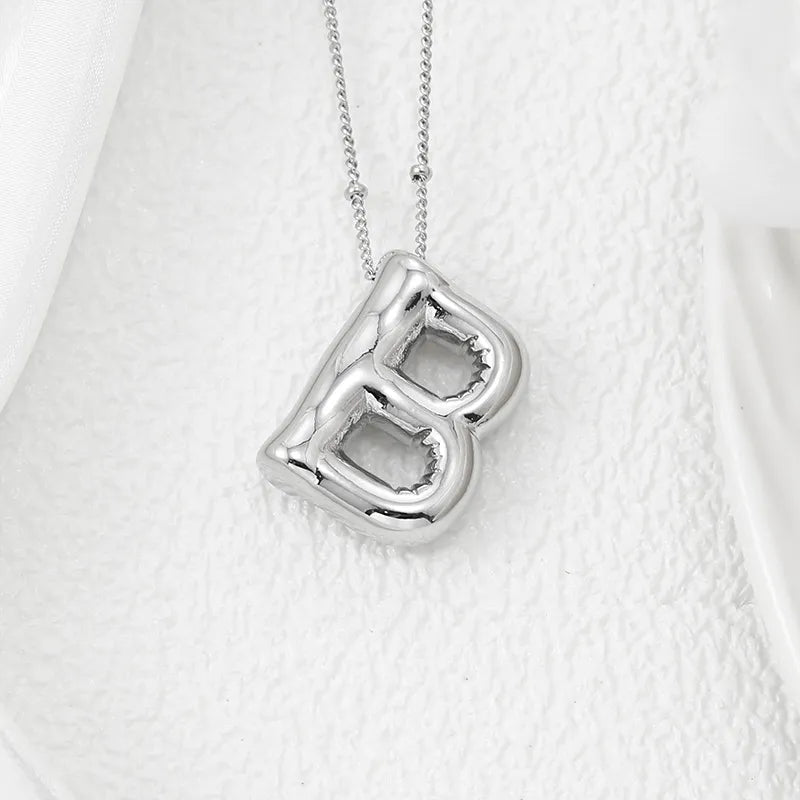 Copper Bubble Letter Pendant Necklace – Platinum-Plated Charm - consueloalondra