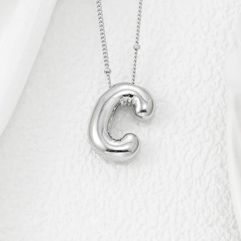 Copper Bubble Letter Pendant Necklace – Platinum-Plated Charm - consueloalondra