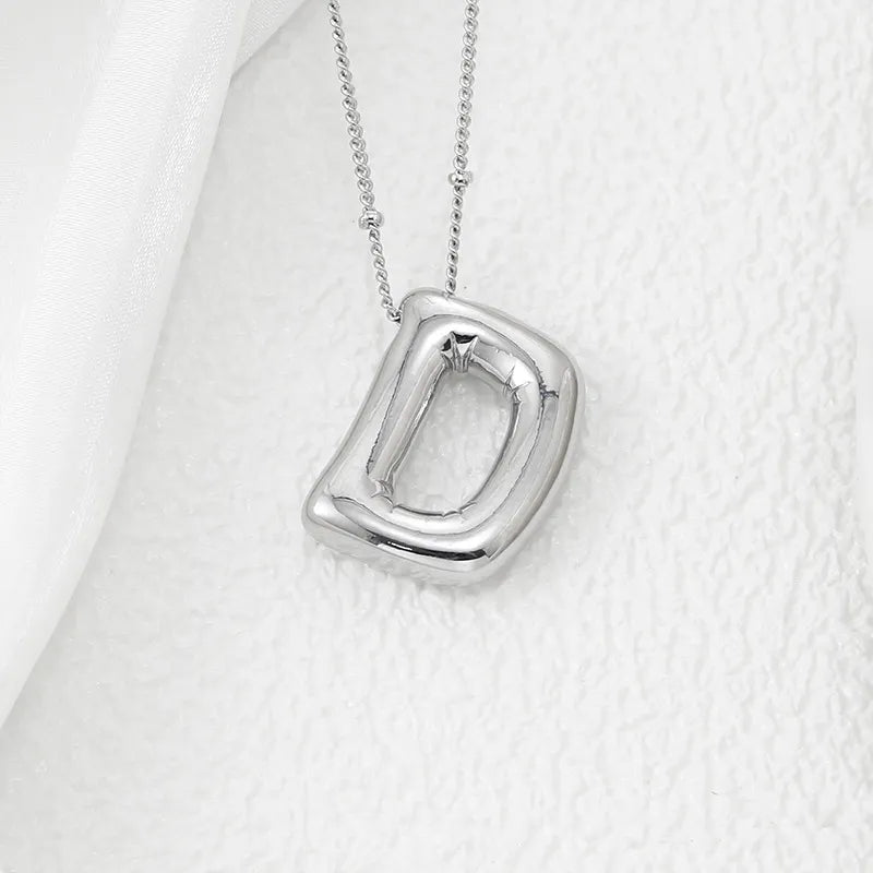 Copper Bubble Letter Pendant Necklace – Platinum-Plated Charm - consueloalondra